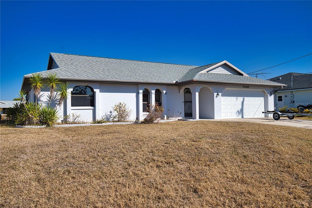 Photo of 12362 Kneeland Terrace, Port Charlotte, FL 33981 (MLS # D6146169)