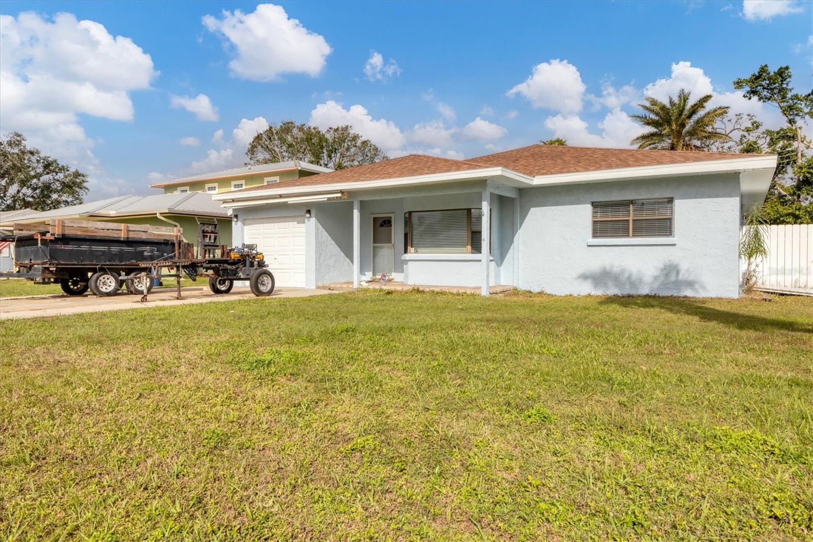 One or more photo(s) has been virtually staged. **Exciting Opportunity Awaits in Gulf Gate!**
Welcome to this 3-bedroom, 2-bathroom, 1-car garage home in the heart of Sarasota, located outside of flood zones and just minutes away from the world-famous Siesta Key. Spanning a generous 1,720 square feet, this property offers ample space and endless opportunities to make it your own. The exterior has been recently painted, giving the home a fresh and welcoming curb appeal. The vaulted ceilings in the living room create an airy and inviting space for relaxation and entertaining. The kitchen features custom-made real wood cabinets and granite countertops, offering a solid foundation to make it your own. The primary suite boasts a walk-in closet and a private ensuite bathroom for added convenience. The home has already undergone major upgrades, including a new roof (2022), a new AC system (2024), and a water heater (2020), providing peace of mind for years to come. This home is ready for your personal touch. Whether you're looking to renovate or simply add cosmetic updates, the home's layout and solid foundation make it an excellent canvas to bring your vision to life. The one-car garage adds convenience and additional storage space. Don't miss this chance to own a home with so much potential in one of Sarasota's most desirable neighborhoods. Schedule your showing today! Call for a private showing.
