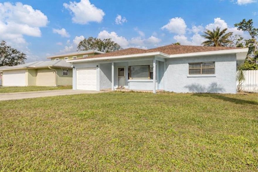 One or more photo(s) has been virtually staged. Discover your dream home in the heart of Sarasota! This 3-bedroom, 2-bathroom residence with a 1-car garage is ideally situated outside of flood zones and just minutes from the iconic Siesta Key. With a spacious 1,720 square feet, this property is waiting for your unique touch.

The exterior has been beautifully painted, providing an inviting first impression. Step inside to find vaulted ceilings in the living room, which create an open and airy atmosphere—perfect for both relaxation and entertaining. The kitchen is a chef's delight, featuring custom real wood cabinets and elegant granite countertops, ready for you to personalize.

Retreat to the primary suite, complete with a walk-in closet and a private ensuite bathroom for your convenience. The home has undergone significant upgrades, including a brand-new roof (2022), a modern AC system (2024), and a new water heater (2020), giving you peace of mind for years to come.

This home is more than just a place to live; it’s an opportunity to craft the lifestyle you desire. Whether you envision a full renovation or simple cosmetic updates, the solid layout lends itself to your creative ideas. Plus, the one-car garage adds convenience and extra storage.

Don't let this golden opportunity slip away! Embrace the chance to own a home full of potential in one of Sarasota's most sought-after neighborhoods. Schedule your private showing today and unlock the door to your future!