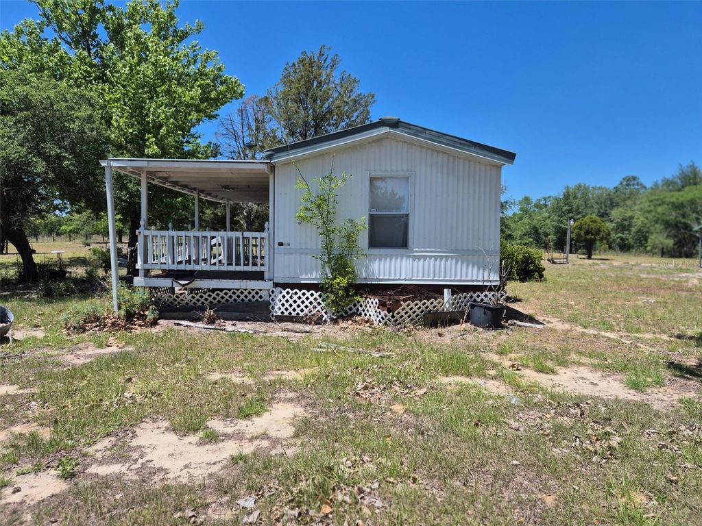 Photo of 11651 NE 73rd Lane, Bronson, FL 32621 (MLS # OM724158)