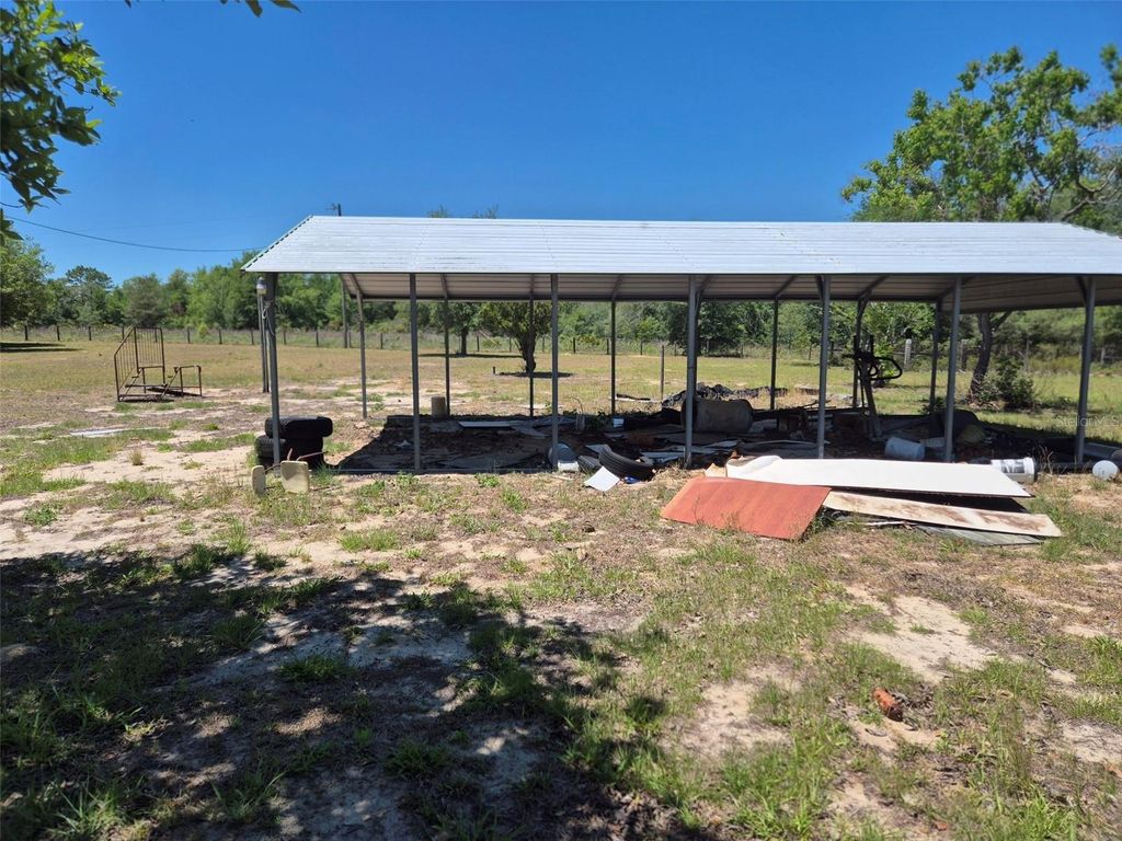 Photo of 11651 NE 73rd Lane, Bronson, FL 32621 (MLS # OM724158)