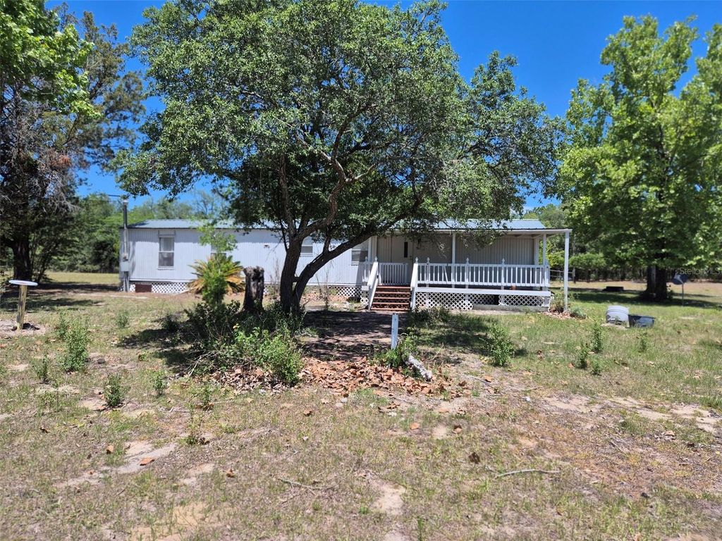 Photo of 11651 NE 73rd Lane, Bronson, FL 32621 (MLS # OM724158)