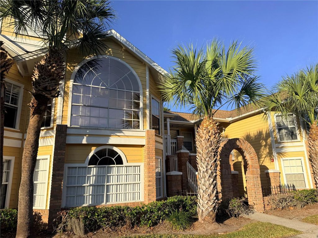 Photo of 2498 Sweetwater Club Circle #61, Kissimmee, FL 34746 (MLS # S5140544)