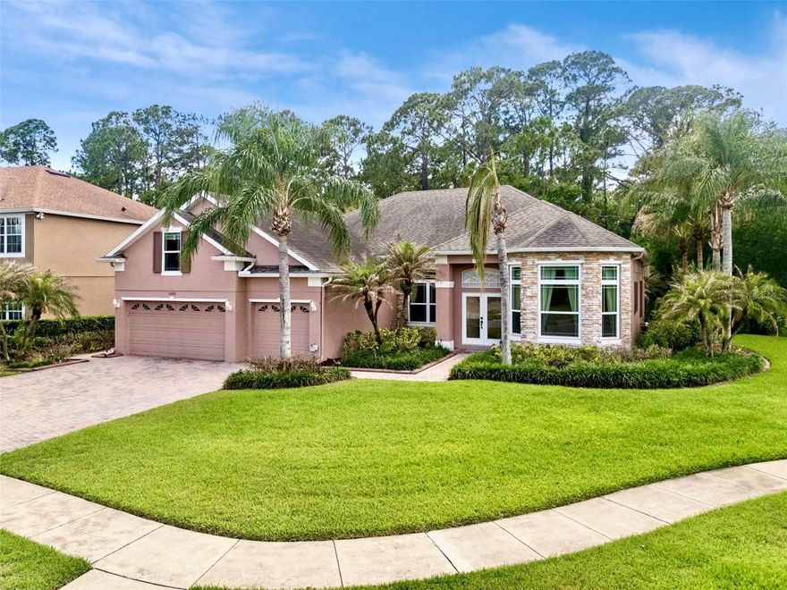 Enjoy Florida living at its finest along the coveted Butler Chain of Lakes in this immaculate 3000+sf mostly single-story home with expansive upstairs flex space on a .24-acre corner lot in beautiful Lake Sheen Reserve. This intimate gated community stands out from the rest with estate homes on larger lots surrounded by lakes, fountains, golf courses and gorgeous trees! Tucked away in nature, yet less than 2 miles from the parks, shops and restaurants of the Walt Disney World Resort! Step into this thoughtfully designed residence with no rear neighbors and notice soaring ceilings accentuated by brand-new custom windows flooding the home with natural light. You'll love the bright, open floorplan offering elegant dining and living rooms, a spacious chef's kitchen with breakfast bar and nook open to a large family room with a cozy fireplace overlooking a lushly landscaped backyard and soothing hot tub in your fully screened patio. The perfect split plan maximizes privacy with a sprawling primary suite on one side and three spacious bedrooms on the other, plus a huge flex space upstairs for your 5th bedroom, office, gym, movie theater or playroom! Notice elegant touches throughout including crown molding, tray ceilings, beautiful wood and tile flooring in main areas, central vacuum and so much more. Enter the double doors to your primary suite with its own access to the back patio and a spa-like bathroom with a separate shower and tub, dual sinks with vanity space, a private water closet, and a walk-in closet. This home features an oversized 3-car garage with new epoxy flooring (2025), storage & a utility sink. Newer roof (2017), new water heater, new windows (2025). Meticulously maintained by its original owner. Lake Sheen Reserve residents enjoy private Butler Chain of Lakes access with a community boat ramp & dock for endless boating, fishing & water sports. Three slalom courses for serious skiers plus access to the famous Bird Island… lake living at its best! Other community amenities include a lakeside firepit, parks & scenic walking trails - all just minutes from Disney, Dr. Phillip’s Restaurant Row, world-class golf, upscale shopping, and Orlando’s top attractions. Zoned for top-rated schools including Windermere High School. This home is your key to unlocking the Florida lifestyle everyone dreams of! Call to schedule your private tour today.