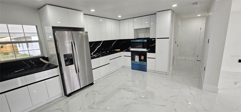 Photo of 1506 E Poinsettia Avenue, Tampa, FL 33612 (MLS # TB8446839)