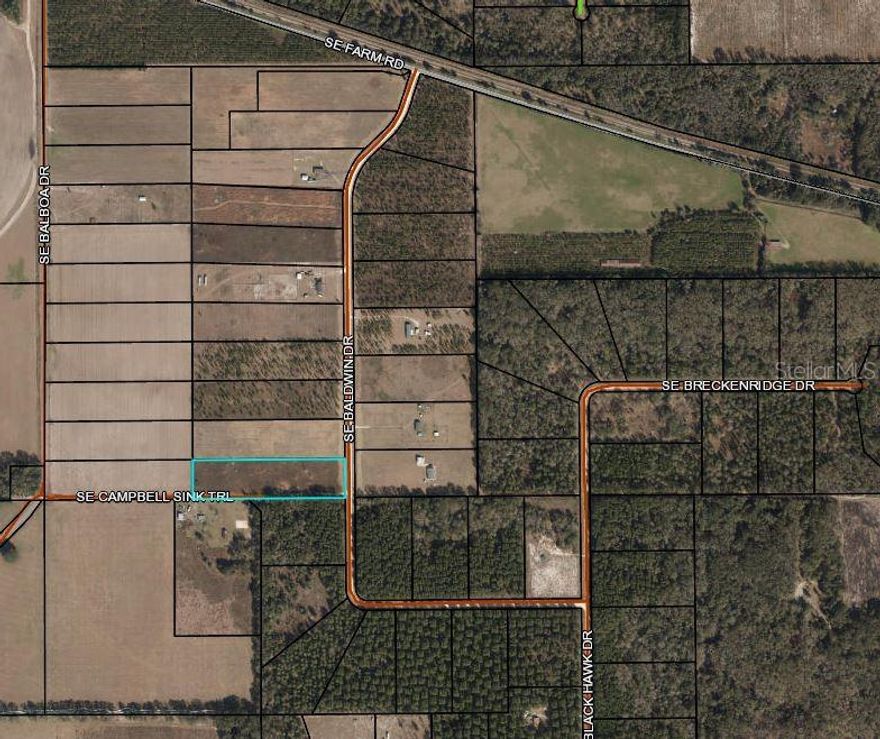 A 5.14-acre vacant lot in Madison county is being sold as a cleared and flat property that is not in a flood zone. It is suitable for building or as an investment property and is considered a great value for the size of the parcel.