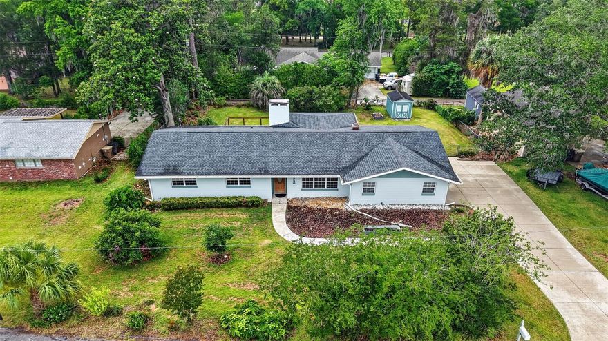 Welcome to a home that has been transformed from the inside out. This beautifully updated property in Southeast Ocala checks every box for buyers who want move-in ready without compromise. From the bones to the finishes, nearly every major system and surface has been upgraded — giving the next owner peace of mind and style in equal measure. Step inside and you'll immediately notice the brand-new luxury vinyl plank flooring flowing throughout the main living areas, complemented by gorgeous porcelain tile in the bathrooms all the way to the ceiling. The fully updated kitchen features granite countertops and beautiful cabinetry, making it the heart of the home. Both bathrooms have been completely renovated with modern finishes that feel fresh and polished. The upgrades go well beyond cosmetic. This home features a newer HVAC system with new ducts, relined pipes, updated water feed lines, and a natural gas water heater — meaning the infrastructure is tight, efficient, and built to last. The laundry room/mudroom has been refreshed, and the home includes a natural gas dryer and stove also, a feature today's buyers love. An alarm system adds an extra layer of security. Finishing touches like upgraded closet doors and custom window treatments give the home a cohesive, elevated feel throughout. Whether you're a first-time buyer or looking to transition into something truly updated, this home delivers value that is hard to find at this price point. Don't wait — properties like this don't last.
