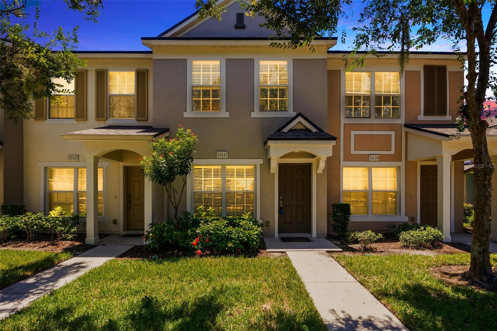 Welcome to low-maintenance living in the heart of Riverview’s sought-after Valhalla community! This spacious 2-bedroom, 2.5-bath townhome offers a light and airy layout with comfortable living spaces and serene pond views.
Downstairs, enjoy an open-concept living and dining area with stylish wood-look flooring and direct access to a screened lanai—perfect for relaxing or entertaining. The kitchen features ample cabinet space and a breakfast bar overlooking the living room.
Upstairs, you’ll find two generously sized bedrooms, each with its own private bathroom. The primary suite includes vaulted ceilings, full bathroom and oversized windows that fill the room with natural light. The upstairs laundry closet adds convenience, while the half bath downstairs is perfect for guests.
Residents of Valhalla enjoy gated security, two sparkling community pools, and beautifully maintained landscaping—all included in the HOA, along with water, sewer, trash, exterior maintenance, and basic cable.
Conveniently located near I-75, the Crosstown Expressway, and major shopping and dining hubs, this home offers both comfort and convenience.
Don’t miss the chance to make this move-in ready townhome your own—schedule a private showing today!