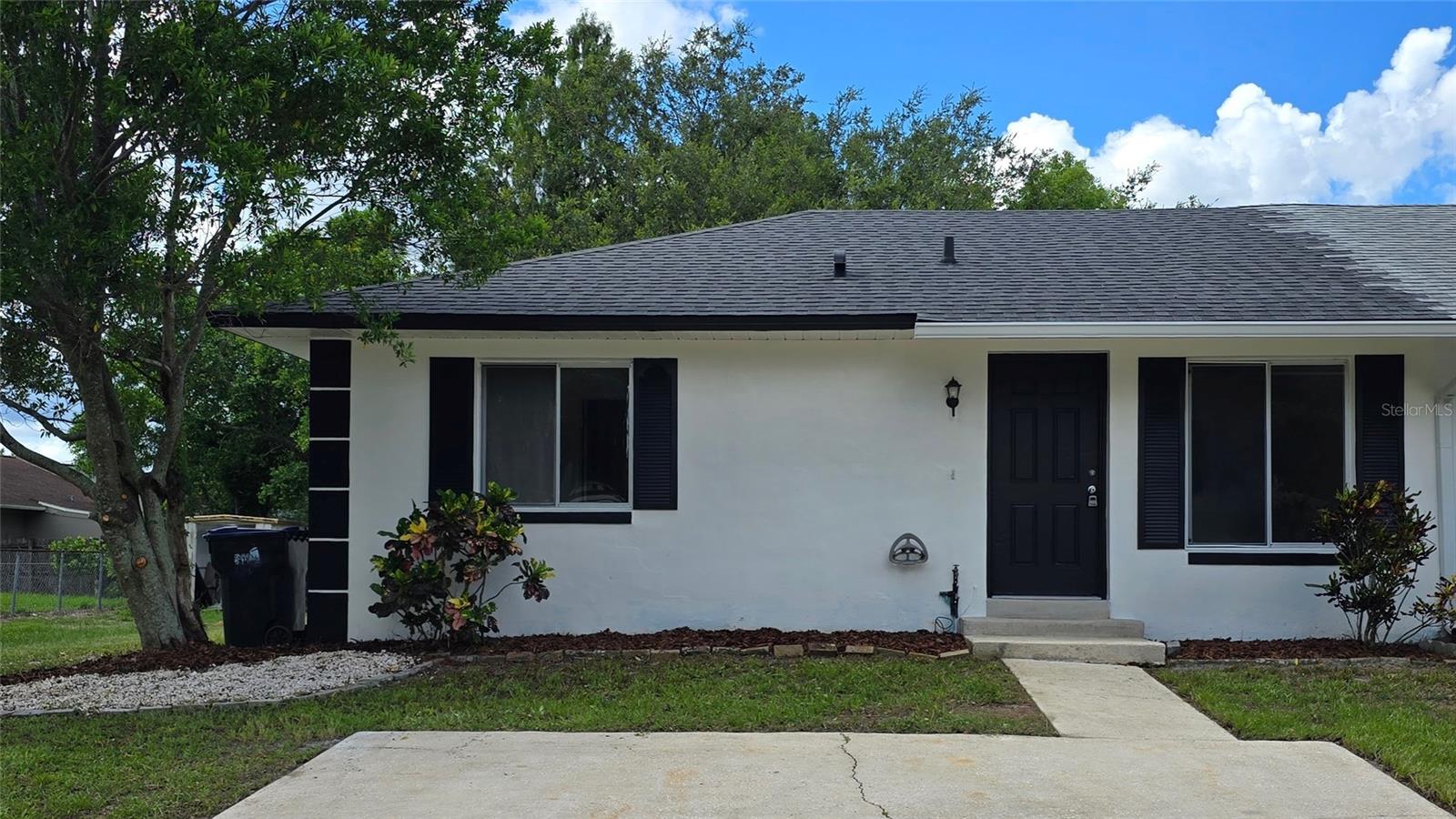 Welcome to this beautifully maintained 2-bedroom, 2-bathroom ½ duplex, perfectly located in a quiet, well-established neighborhood. This home offers a comfortable and functional layout, ideal for first-time buyers, downsizers, or investors. Step inside to find freshly painted interiors and ceramic tile flooring throughout—providing a clean, modern look that’s also easy to maintain. The spacious living area flows seamlessly into the kitchen and dining spaces, perfect for entertaining or relaxing at home. Both bedrooms has walk-in closet space and natural light, while the two full bathrooms provide privacy and convenience for family or guests. Enjoy peace of mind knowing the drain field was replaced in January 2025, a major upgrade that adds long-term value and reliability to the home. Outside, you’ll find a private yard space, ideal for gardening, pets, or weekend BBQs. With no HOA and low maintenance, this property offers flexibility and affordability rarely found in today’s market.