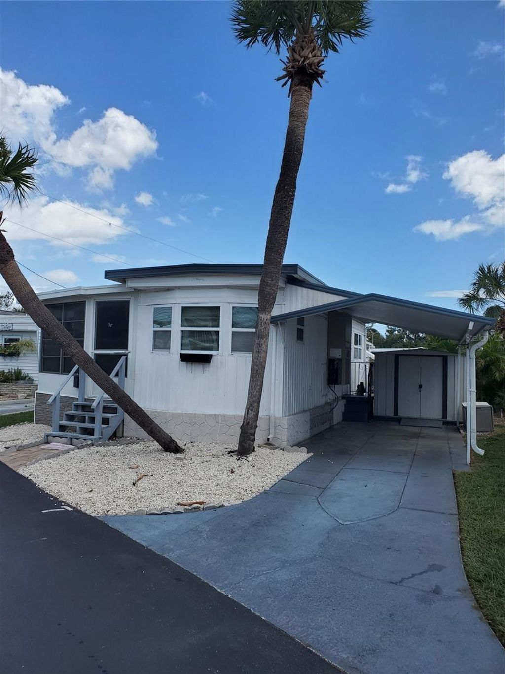 Photo of 4851 W Gandy Boulevard #B4L7, Tampa, FL 33611 (MLS # TB8436114)