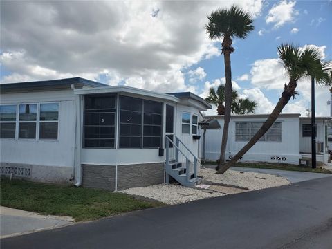 Photo of 4851 W Gandy Boulevard #B4L7, Tampa, FL 33611 (MLS # TB8436114)