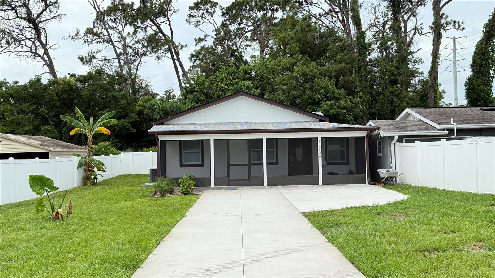 For rent – Brand new home in Zephyrhills, FL! Located at 37542 B Avenue, Zephyrhills.
Home Features, 2 spacious bedrooms, 2 modern bathrooms, a dedicated office/bonus room, an open living and kitchen area with an island, brand-new appliances and finishes, a fully fenced yard for privacy, a screened-in front porch, fresh landscaping, and a wide driveway. LAWN SERVICE AND WATER INCLUDED