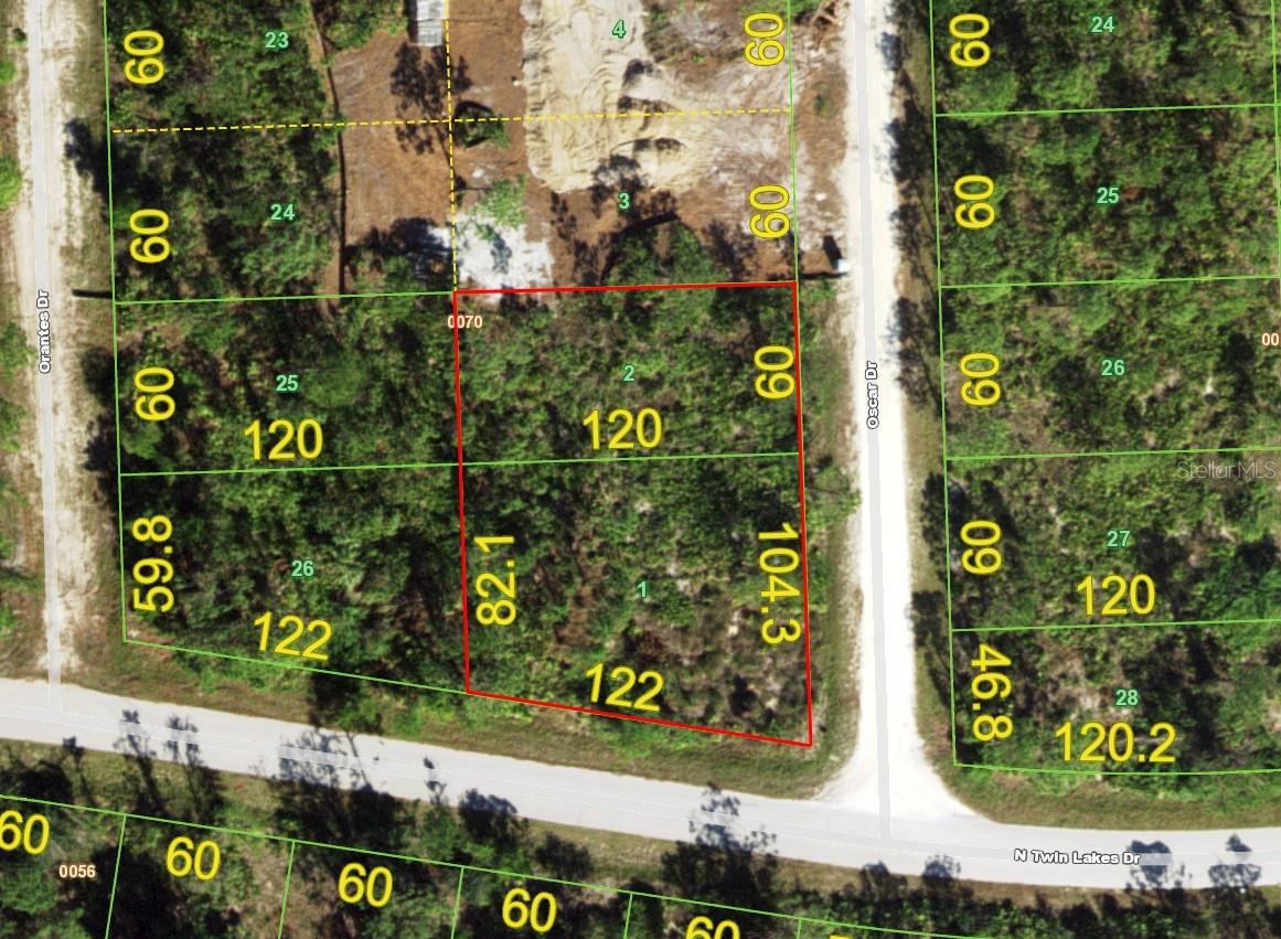 Nestled in the serene community of Tropical Gulf Acres, this 18,150 sq ft corner lot offers a rare opportunity to create your dream home in a peaceful, rural setting. Not in a Scrub Jay Zone, this property provides ample space and privacy, free from HOA restrictions or deed limitations—giving you the freedom to build exactly the way you envision. Enjoy the tranquility of country living while remaining conveniently close to key amenities. This prime location is just minutes from Punta Gorda Airport, I-75, shopping, dining, and the breathtaking Gulf Coast beaches. Plus, with no flood zone concerns, you can plan your build with confidence. Whether you're looking to invest or craft your ideal retreat, this property offers the perfect combination of location, space, and potential. Seize this incredible opportunity today!