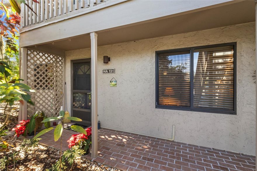 Your Pelican Cove drive begins when the front gate lifts and the beauty of Pelican Cove unfolds. The main living area overlooks the harbor and has large rear deck, providing the sought-after Florida indoor/outdoor lifestyle. This condo has an updated A/C unit, hot water tank, electric panel.  A canopy tree community on Sarasota Bay, Pelican Cove is a 75-acre gated, vibrant, waterfront community nestled among manicured tropical foliage truly offering something for everyone. Abundant amenities include an 86-slip boat harbor with sailboat water, excellent rates, and a launch dock for kayaks and canoes, 6 heated swimming pools, hot tub, 3 clubhouses, 4 lighted tennis courts, pickleball, shuffleboard, basketball, dog walk area, 5.5 miles of walking trails and boardwalks as well as fishing gazebos, water exercise classes, exercise facilities, 2 art studios and a pottery classroom. Take classes at Pelican Cove University or join one of the more than 37 clubs, including photography, fiber art, bike riding, yoga, Tai Chi, culinary arts, and card clubs. Woodworking, sculpting and evening jazz & classical music concerts round out the active lifestyle.