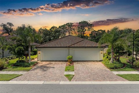 Photo of 12115 Amica Loop, Venice, FL 34293 (MLS # TB8424130)
