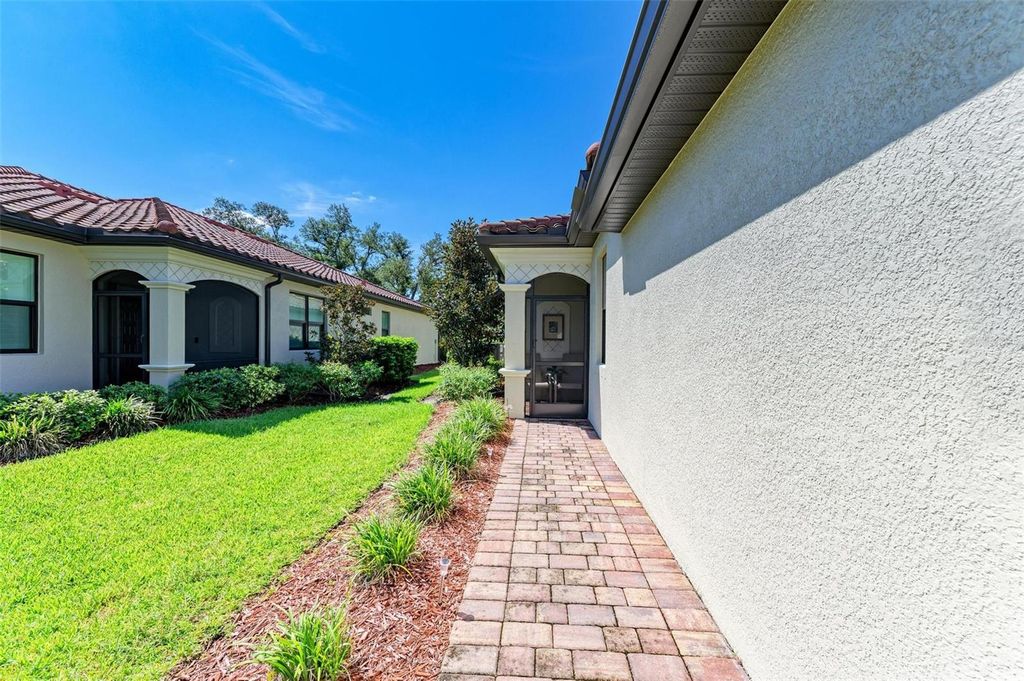 Photo of 12115 Amica Loop, Venice, FL 34293 (MLS # TB8424130)
