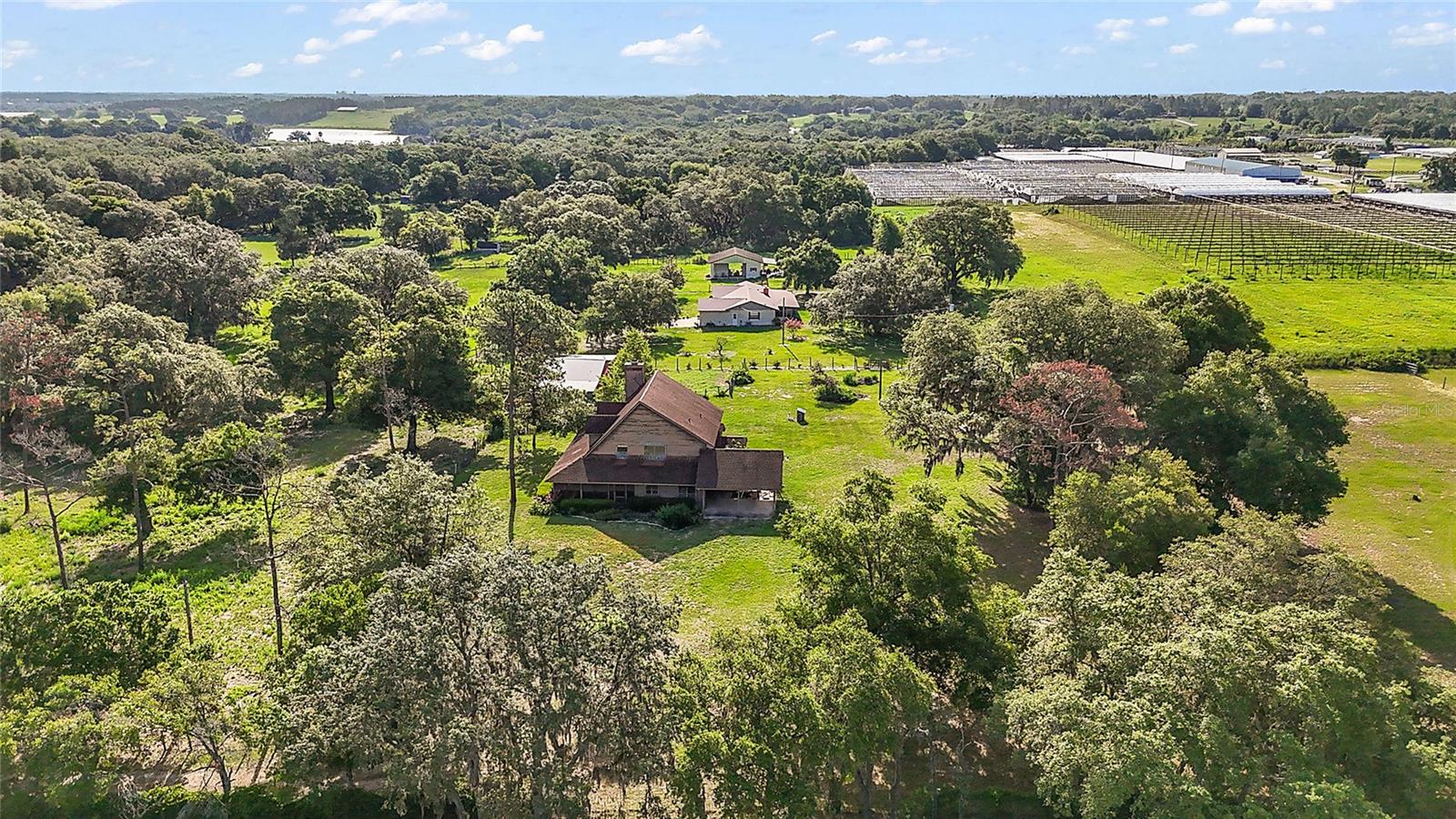 No HOA!! Live the Lake Avalon Groves Lifestyle! Over 4 Acres | Prime Location Discover a rare opportunity to own 4.46 acres of versatile land in the peaceful Lake Avalon Groves community — close to everything, yet perfectly tucked away from the hustle and bustle. This property features a 2,330 sq ft home, built in 1986, offering 3 bedrooms and 2.5 bathrooms —Upper and fixer, ready for your personal renovation or the perfect site to build your dream custom home. With Agricultural Zoning (A-1), this land welcomes farm animals (horses, cattle, goats, chickens, etc.), fresh produce farming, Wide-open land with peaceful rural charm. Prime Location: 4.5 miles to Hamlin Town Center, 4.6 miles to Orlando Health Horizon West Hospital, 8 miles to Historic Downtown Winter Garden & Farmers Market, 10 min to SR 429 Exit, 30 min to Downtown Orlando, 20-30 min to Disney World, Universal Studios, and Orlando attractions and restaurants. Enjoy serene farm life with the convenience of nearby shopping, healthcare, entertainment, and top rated schools. Whether you’re a renovation enthusiast, builder, investor, or nature lover, this property offers endless potential. Schedule your private showing today — properties like this in Lake Avalon Groves are rare!