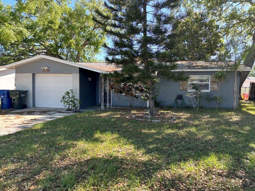Welcome to this charming Largo gem offering the perfect blend of comfort, updates, and location! This well-maintained 2-bedroom, 1-bath home with a 1-car garage features an inviting open floor plan designed for easy everyday living and entertaining. Enjoy peace of mind with major upgrades already completed, including updated windows, a newer roof (2020), and HVAC system (2022). A versatile bonus room provides the ideal space for a home office, hobby room, or guest area. Step outside to your private fenced backyard complete with a covered rear patio—perfect for relaxing, grilling, or enjoying Florida’s beautiful weather year-round. Located in a desirable non-flood zone, this home is just minutes from Indian Rocks Beach, the Southwest Recreation Complex, Pinellas Trail, shopping, schools, and dining. Whether you’re looking for a primary residence, vacation retreat, or investment opportunity, this move-in-ready property delivers exceptional value in an unbeatable location!