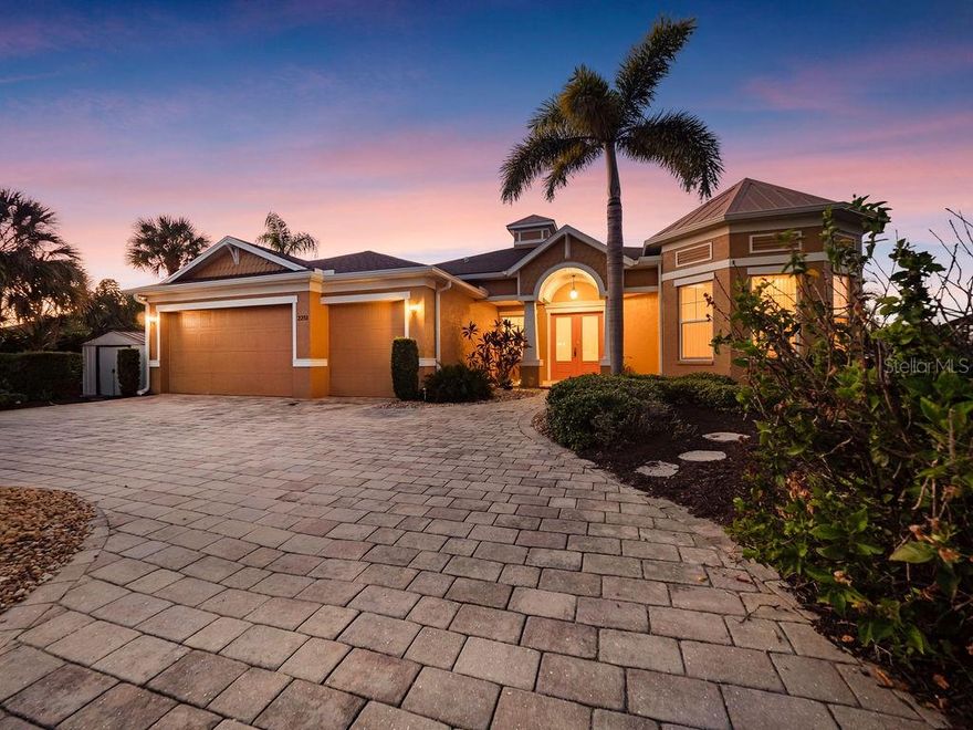 Welcome to your private oasis in vibrant South Sarasota—where luxury living meets laid-back, canal-front charm. Just minutes from Siesta Key and with no HOA, this 4-bedroom, 4-bathroom pool home with a 3-car garage, office, and private boat lift is the ultimate coastal retreat. A circular brick paver driveway and storage shed add style and practicality. Inside, French doors open to an expansive floor plan with stunning views of the pool and canal. The office (or 4th bedroom) features tray ceilings, hardwood floors, and an ensuite bath. The chef’s kitchen boasts wood cabinetry, granite counters, stainless steel appliances, and a walk-in pantry. The living area, with coffered ceilings and pocket sliders, blends seamlessly with the lanai. The primary suite includes two walk-in closets, pool access, and a spa-like bath. A split plan adds privacy with two guest rooms and a flexible bonus room. Outside, enjoy a fenced yard, pool/spa, dock with snook lights and lift—minutes to beaches, dining, and Sarasota Bay.