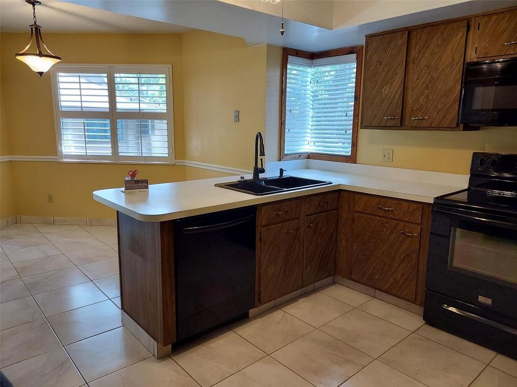 Photo of 20 Mid Oaks Circle #20, Palm Coast, FL 32137 (MLS # FC313420)