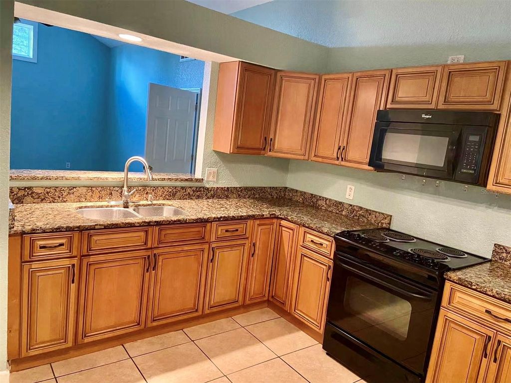 Photo of 135 Coralwood Circle, Kissimmee, FL 34743 (MLS # TB8495304)