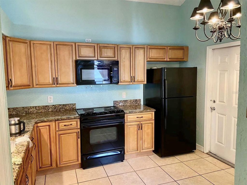 Photo of 135 Coralwood Circle, Kissimmee, FL 34743 (MLS # TB8495304)