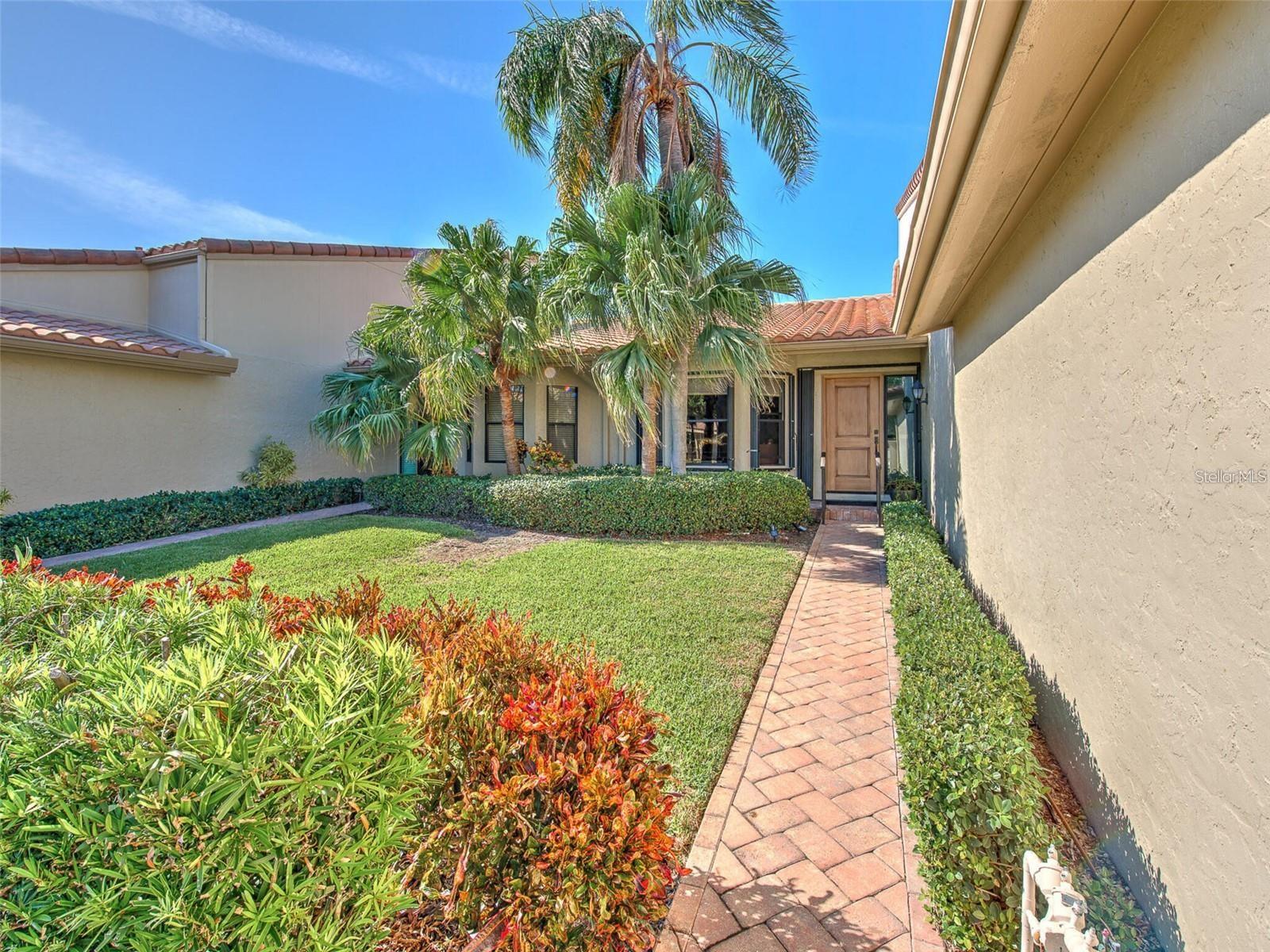 Welcome home! Enjoy the serenity of this 3 bed, 3 bath, 2 car garage residence, located in Harbour Oaks within the gated community of Bay Isles in the heart of Longboat Key. This tastefully appointed home with open concept floor plan features vaulted ceilings and skylights which create an abundance of natural light throughout the home. The amazing gourmet kitchen offers custom cabinets with soft-close drawers, quartz counters, an appliance package inclusive of refrigerator, induction range, dishwasher and microwave. The Great Room offers beautiful built-in cabinetry and a fireplace. The large primary bedroom, boasts an ensuite spa style bathroom with walk-in shower and dual vanities, and a walk-in closet. Two secondary bedrooms both with ensuite baths are spacious and comfortable. At the end of the day, relax on the screened in patio, overlooking the lush expanse of the manicured greens and relish in the ambiance of breathtaking sunsets or alternatively step out of your front door to enjoy a refreshing dip in the community pool. All residents have access and privileges to the private Bay Isles Beach Club with miles of sugar sand beaches and calm waters of the Gulf of Mexico. All the conveniences of shopping dining and entertainment is just a short drive over the bridge. AVAILABLE AS A SHORT OR LONG TERM LEASE. SEASONAL RENTAL RATES DIFFER FROM ADVERTISED RATE - PLEASE INQUIRE.