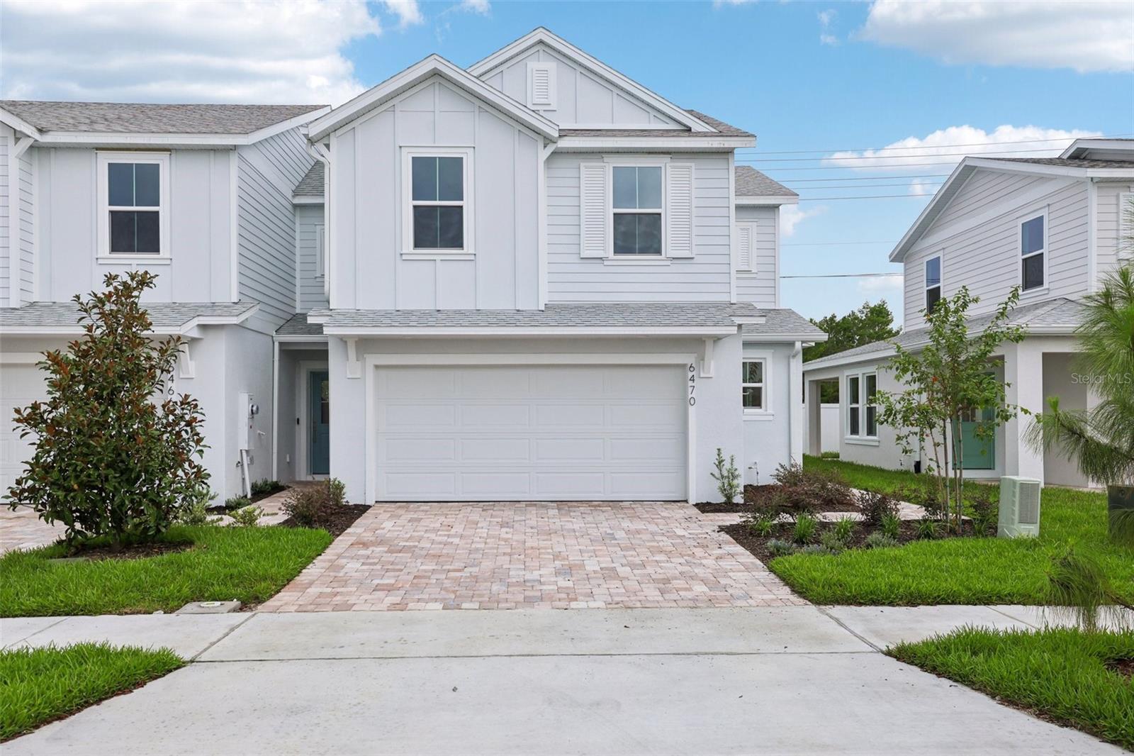 Welcome to the Coronado, a spacious and thoughtfully designed floorplan in the desirable Cyrene community at Harmony. This home boasts 1469 of luxurious living space, offering 3 bedrooms, 2.5 bathrooms, and a wealth of features that cater to both comfort and style. Step inside to an inviting open-concept layout where natural light pours through large windows, highlighting the high-end finishes and modern details throughout. The kitchen is a chef’s dream, equipped with a large center island, and ample cabinetry, perfect for meal prep or entertaining guests. The expansive great room seamlessly flows into the dining area, creating the ideal setting for both relaxing and hosting. The primary suite is a serene retreat, featuring a spacious bedroom, a walk-in closet, and a luxurious en-suite bath with dual vanities, Two additional well-appointed bedrooms provide plenty of space for family, guests. Additional highlights include a two-car garage, a convenient laundry room, and energy-efficient features throughout the home. Located in the desirable Harmony community, residents enjoy access to top-rated schools, parks, community pool.