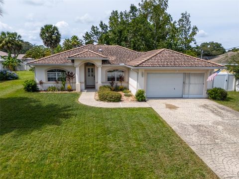Photo of 6 Raleigh Drive, Palm Coast, FL 32164 (MLS # FC312871)