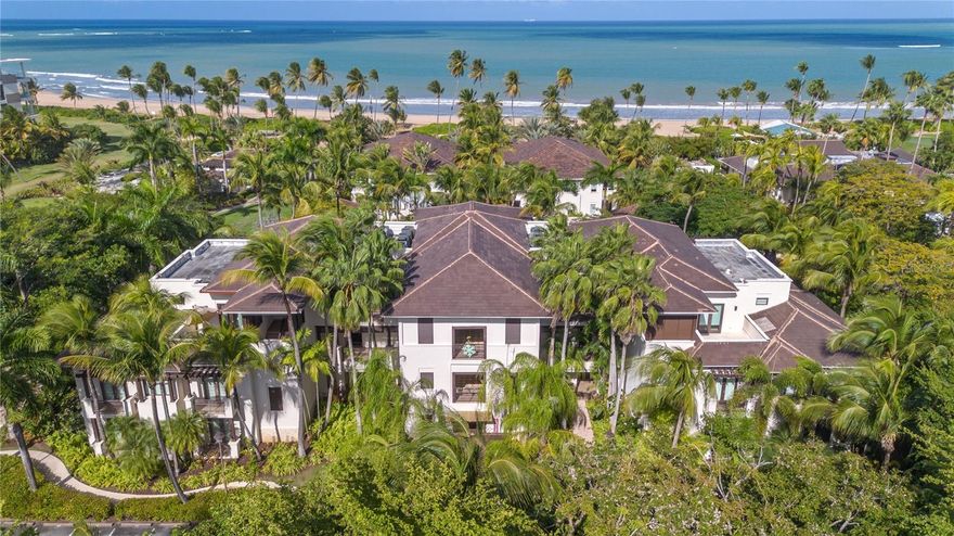 Located within the exclusive Las Ventanas I at Bahía Beach, this elegant residence offers a refined blend of tropical serenity and luxury living. Surrounded by lush landscaping and mature palm trees, the property is set just moments from the beach, providing a true resort-style lifestyle in one of Puerto Rico’s most prestigious gated communities.

The home features bright, open interiors with soaring ceilings and beautiful architectural details that create a sense of space and calm. Generously sized bedrooms offer comfort and privacy, including a serene primary suite with direct access to a private balcony overlooking tropical greenery. Neutral tones, quality finishes, and abundant natural light make the interiors both timeless and inviting.

Residents of Las Ventanas I enjoy access to the world-class amenities of Bahía Beach Resort & Golf Club, including pristine beaches, walking trails, golf, and fine dining. This property is ideal as a full-time residence or a luxurious second home, offering privacy, security, and an unparalleled coastal lifestyle in Río Grande.