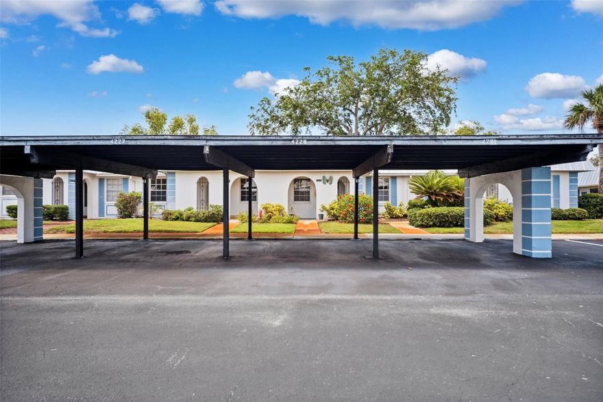 SELLERS ARE HIGHLY MOTIVATED—BRING AN OFFER TODAY! Imagine your life in a peaceful oasis, surrounded by lush greenery and soothing nature sounds. This well-maintained, FULLY FURNISHED 2-bedroom, 1-bathroom condo offers comfort and elegance in a serene, well-kept community. Step inside to find an inviting open-concept living and dining area with large tile flooring and a mirrored accent wall enhancing the spacious feel. The cozy sunroom is perfect for relaxation, offering views of the vibrant courtyard, complete with outside storage and a new water heater.

The updated kitchen is a modern delight, featuring granite countertops, a mosaic tile backsplash, and crisp white cabinetry providing ample storage. A new refrigerator and premium microwave complete this culinary space. The two generously sized bedrooms offer tranquil retreats, each with cedar wood closets that combine fragrance with style. The bathroom focuses on accessibility, featuring a new faucet and a handicap-accessible shower for easy use.

Enjoy peace of mind with a recently serviced AC and cleaned air ducts, new water heater and new roof!! This charming condo, with its modern finishes and classic Florida appeal, is ideal for year-round living or as a seasonal getaway. Conveniently located near the clubhouse, you’ll have easy access to all the community's amenities. The monthly condo fee covers cable & internet, water, trash, sewer, ground maintenance, exterior upkeep, and access to a pool, clubhouse, library, laundry facility, game room, and more! Don’t miss this fantastic opportunity—contact us now to make this condo your own!
