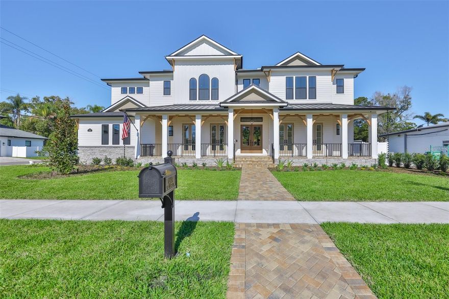 Under Construction. Welcome to 4123 W. Corona Street, a masterpiece of modern living nestled in the heart of South Tampa. Priced at $3,199,000, this exquisite new construction home combines sophistication and comfort, offering an unparalleled lifestyle in the coveted Mabry, Coleman, and Plant school district.
As you approach, the home's southern manor charm greets you with elegant French doors and a welcoming covered porch. Step inside and feel the seamless flow of the expansive 5,162 sq ft interior. Sunlight pours through tall windows, illuminating the two-story foyer and inviting you to explore the open, airy spaces.
Imagine entertaining in the spacious living areas, where artful touches and luxury finishes create an ambiance of warmth and elegance. The gourmet kitchen is a chef's dream, featuring upscale Fisher & Paykel appliances, double islands, and custom cabinetry. A hidden pantry prep room with a pass-through enhances the kitchen's functionality, while the open flow to the family room?complete with a double-sided gas fireplace?makes it an inviting space for gatherings. The first floor's flexible layout includes a sophisticated study, a dining room with a stunning glass-enclosed wine display, and a cabana room equipped with a full bath and space for a stackable washer/dryer. A mudroom completes the main level, ensuring every detail caters to your modern lifestyle.Ascend to the second level and discover the luxurious primary suite, a true retreat with sound-insulated walls, a spa-like bathroom featuring a soaking tub, and an expansive custom closet. Each of the additional three bedrooms offers its own custom bath and generous closet space, providing comfort and privacy for family and guests. The media room and second-floor laundry room, complete with a dog wash station, add convenience and functionality. Step outside to the breathtaking rear property, where a covered lanai with a stained wood tongue & groove ceiling overlooks the sparkling pool and spa. Imagine savoring your morning coffee here, or hosting barbecues in the summer kitchen as the quiet street hums with peaceful evenings. This home is equipped with top-of-the-line features, including an elevator, whole-home generator, impact windows, and a Moen Smart Leak Detection system. Enjoy peace of mind with in-wall pest tubes, an Elan Smart Home System, and a 2-10 Builder Warranty. With smooth drywall, interior 8ft doors, crown molding, a 25 Seer HVAC system with multi-zoned control, Icynene R-21 spray foam insulation, and speaker pre-wires, every aspect of this home is designed for luxury and efficiency. Imagine living in a home where every detail is crafted for your comfort and enjoyment. At 4123 W. Corona Street, you don't just purchase a home, you embrace a lifestyle. Come experience the harmony of elegance, innovation, and warmth that this exceptional property offers. Make it yours today.