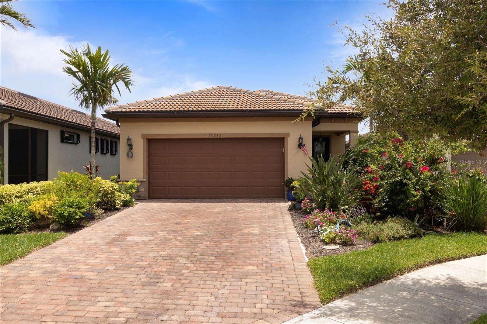Welcome to the dream home you’ve been waiting for—13935 Campoleone Street in the RESORT-STYLE, gated community of IslandWalk at the West Villages! Perfectly positioned on a quiet cul-de-sac with serene lake views, this 3-bedroom, 2-bathroom gem offers 1,575 sqft of stylish, upgraded living space that checks every box and then some. Step through a charming, flower-lined entry and into an open, light-filled layout featuring crown molding, IMPACT windows and doors, and thoughtful designer touches throughout. The gourmet kitchen is a true showstopper with a 4-seat breakfast bar, pull-out cabinet drawers, and a walk-in CUSTOM WINE ROOM—temperature controlled at 62° and perfect for entertaining in style.
But the magic doesn’t stop there—step outside and fall in love with your own private paradise. Take a dip in the HEATED SALTWATER pool, cook and host with ease in your fully equipped custom OUTDOOR KITCHEN (with flat-top grill, fridge, sink, and cabinetry), and relax while soaking in the peaceful lake views. The primary suite is your personal retreat, offering a spacious walk-in closet and a walk-in shower.
Living in IslandWalk means access to unmatched world-class amenities: 2 resort-style pools, 2 lap pools, 12 PICKLEBALL courts, 8 tennis courts, 6 bocce courts, basketball courts, playground, movement studios, fitness centers, a DOG PARK, fire pits, multiple clubhouses, and even a full-time ACTIVITIES DIRECTOR to keep your social calendar full. All connected by stunning Venetian-style bridges and walkways. And just minutes from Downtown Venice, GORGEOUS GULF BEACHES, Wellen Park, and CoolToday Park, you’ll have everything you need at your fingertips.
This is more than a home—it’s a lifestyle. And it’s waiting for you.