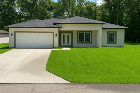 Photo of 10075 N Conrad Point, Citrus Springs, FL 34434 (MLS # O6316715)