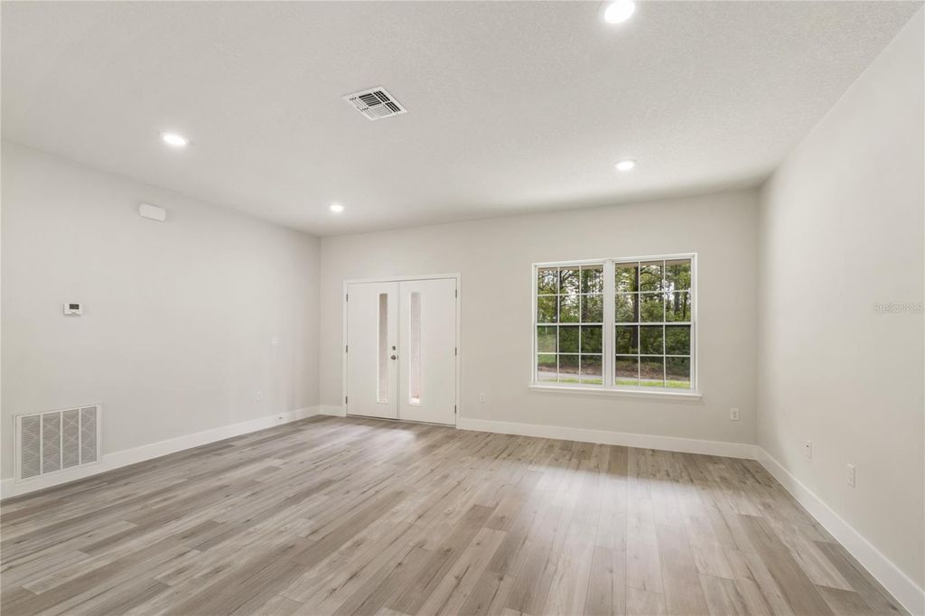 Photo of 10075 N Conrad Point, Citrus Springs, FL 34434 (MLS # O6316715)