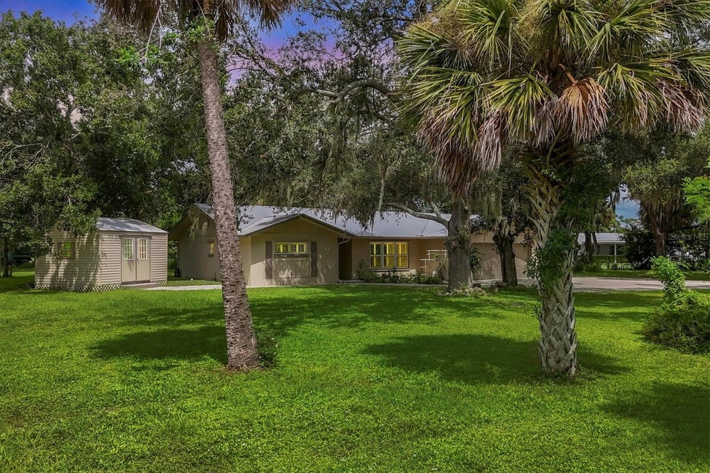 Photo of 336 Timbruce Lane NW, Port Charlotte, FL 33952 (MLS # N6146046)