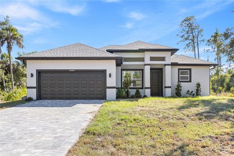 Photo of 15467 Hillsborough Boulevard, Port Charlotte, FL 33954 (MLS # O6351241)