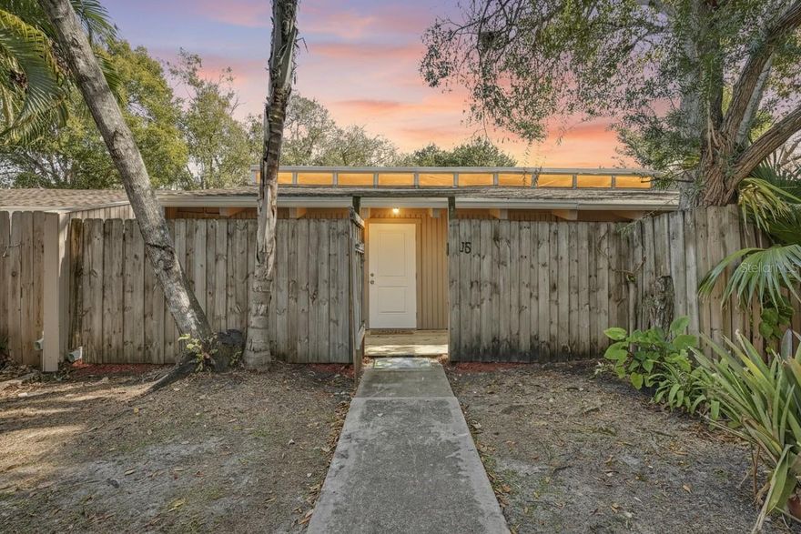 Welcome to a rare opportunity to own an updated villa-style 2-bedroom condo just over a mile from downtown Sarasota at a price point that’s becoming increasingly hard to find. This light and bright, newly renovated home features vaulted ceilings, fresh paint throughout, brand-new flooring, in unit washer/dryer and an updated kitchen with new cabinetry, new range, refrigerator and a 2025 roof! The open, airy feel is enhanced by natural light and thoughtful updates that make the space feel clean, modern, and move-in ready. What truly sets this home apart are the two private, fully fenced outdoor spaces—a front courtyard and a rear porch, both with new decking. This indoor-outdoor layout offers rare privacy for a condo and is perfect for entertaining or creating a personal outdoor retreat. Condo fee of $450 includes trash, water, sewer, community pool, lawn and exterior maintenance. Located just minutes from downtown Sarasota’s dining, arts, and waterfront, this home delivers walkable proximity and unbeatable convenience without the downtown price tag. Whether you’re looking for a low-maintenance Florida getaway or a full-time residence close to the action, this property offers exceptional value and lifestyle appeal.