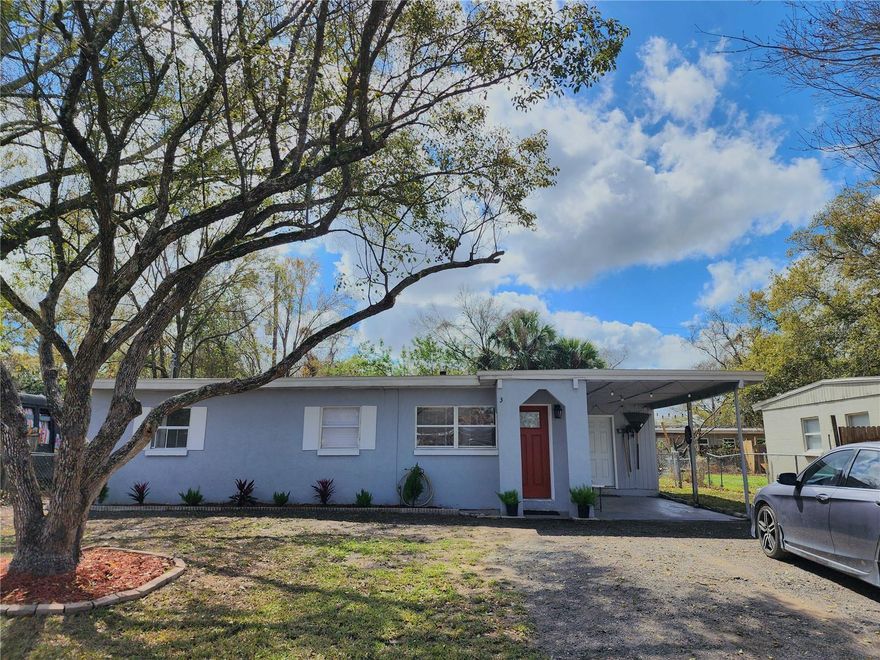 MOVE IN READY AND FULLY RENOVATED! This 3-bedroom Orlando gem is the perfect "stop renting" solution or a juicy opportunity for savvy investors looking for a HIGH DEMAND RENTAL AREA. The interior shines with a BRAND-NEW AC, modern flooring, fresh paint, and a sleek kitchen featuring stainless steel appliances. The beautifully updated bathroom showcases a stunning stand-up shower with custom tile work and a built-in nook. HIGHLIGHTS include an oversized laundry room and a bright 3rd bedroom—ideal for a sunny home office or den. Outside, enjoy RARE SPACE FOR SUCH A CENTRAL LOCATION with a massive backyard, private carport, and an extra-wide driveway. Whether you're a first-time buyer tired of renting and DONE WITH LONG COMMUTES, or an investor hunting for a SOLID LONG-TERM RENTAL, this property checks every box—at a price point that still makes sense. The area is also currently benefiting from infrastructure upgrades, and the street is scheduled to be FRESHLY REPAVED once work is complete. NO HOA and completely turnkey—this is the central hub you’ve been waiting for! Schedule your tour today!