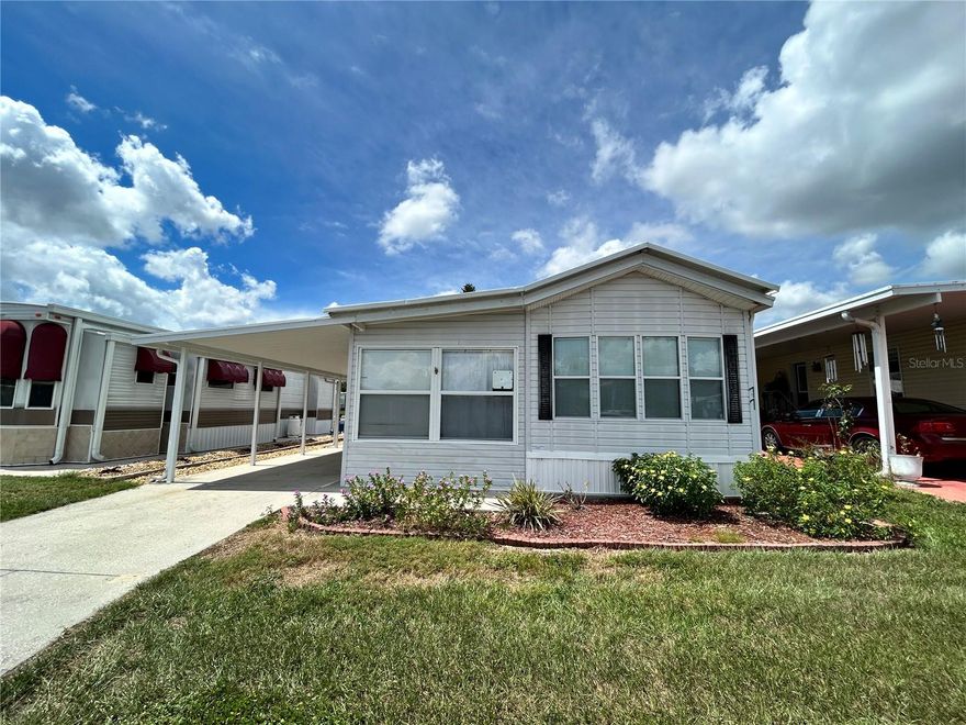 2/1 in SE Winter Haven.  NO LOT RENT!! Gated Community with Pool, clubhouse and more.