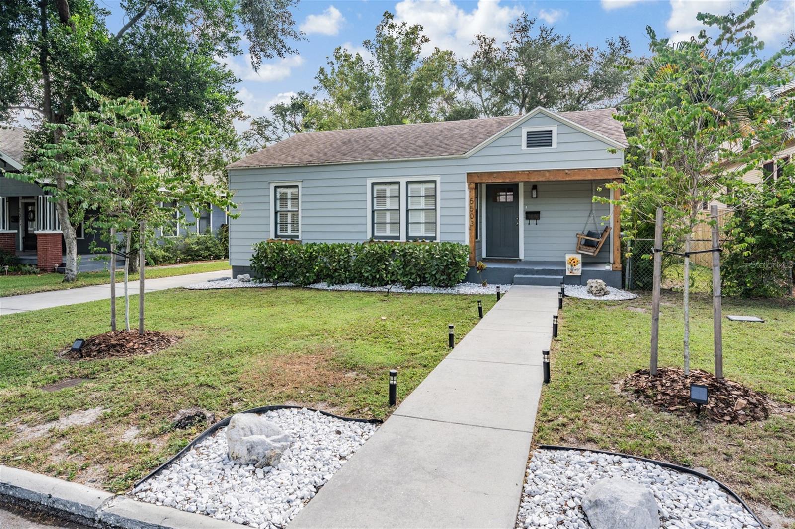 Welcome to a beautifully preserved 1940s bungalow nestled in the heart of historic Seminole Heights, Tampa. This charming home offers a unique blend of vintage allure and modern convenience. With the main home spanning 1,007 square feet, this residence includes three cozy bedrooms and a full bathroom. There is also a 300 square foot DETACHED STUDIO GUEST COTTAGE that features a bedroom/studio space, full bathroom, washer/dryer hookup and a separate entrance! This unique property offers the opportunity for those looking for an income producing property, art/music studio, or separate home office- the possibilities are endless!
Step inside to discover beautifully maintained hardwood floors that flow throughout the home, adding warmth and elegance to every room. The authentic door hardware evoke the home's rich history, while thoughtful upgrades like a NEWER ROOF (2020), NEWER HVAC and ductwork (2022), NEWER water heater (2021) and NEWER fresh exterior paint (2023) ensure contemporary comfort and peace of mind for its new owners.
The remodeled kitchen, complete with stylish butcher block countertops, a chic coffee bar, and state-of-the-art stainless steel LG ThinQ appliances (2023) perfectly complements the home's welcoming aesthetic. Enjoy the convenience of in-home laundry with new washer and dryer units (2023).
Outside, the generous 7,728 square foot lot invites a host of outdoor activities, featuring a custom-made pergola and separate fire pit area—a perfect setting for gatherings. The beautiful oversized backyard is just begging for you to entertain friends and family, just in time for football season! With its blend of historic character and modern amenities, this 1940’s bungalow home with detached guest cottage is a true Seminole Heights gem, offering a warm, inviting atmosphere both inside and out.
Located conveniently off I-275, travel to and from work and local amenities is a breeze. Walking distance to Starbucks and a local yoga studio, just 0.2 miles to Seminole Garden Center, 1.7 miles to Zoo Tampa, and close to many locally raved about restaurants, this home is in the ideal location! Don’t miss the opportunity to make this unique property your own! Call to book your private tour today and see all that this home and Seminole Heights has to offer.