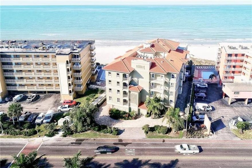Rare opportunity!! This exclusive residence at Del Mar West offers privacy and convenience that is hard to find on the Gulf with its own PRIVATE STAIRS TO THE POOL/BEACH from your private balcony!! No elevator required!! If you do choose to use the elevator, you will arrive on the second floor and enter the unit through a large foyer which leads to beach views all around in the living and dining rooms. As you move to the kitchen area, you will find a central hub featuring an oversized island, high end appliances, granite counters, solid wood cabinetry, a breakfast area, a built-in desk area, and its own small balcony. The Master Suite is located directly on the Gulf and has his and hers walk-in closets. The Master Bath is elegantly finished with two vanities, large tub, and a large shower. The three guest bedrooms all feature a walk-in closet and their own private bathroom. The unit features 9'6" ceilings, granite countertops throughout, travertine floors, Cat-5 wiring, tray ceilings, and a large storage closet. Included with the unit are a large 2 car private garage and a poolside "cabana" (storage room). Del Mar West has a total of 8 residences (only 2 per floor!) with amazing views of the Gulf, building amenities include a Gulf side heated pool and spa, covered patio with outdoor furniture, and a secure lobby with coded entry. The exterior of the building is currently being painted and the landscaping is being replaced. These projects should be completed in July and have been paid for by the owners.