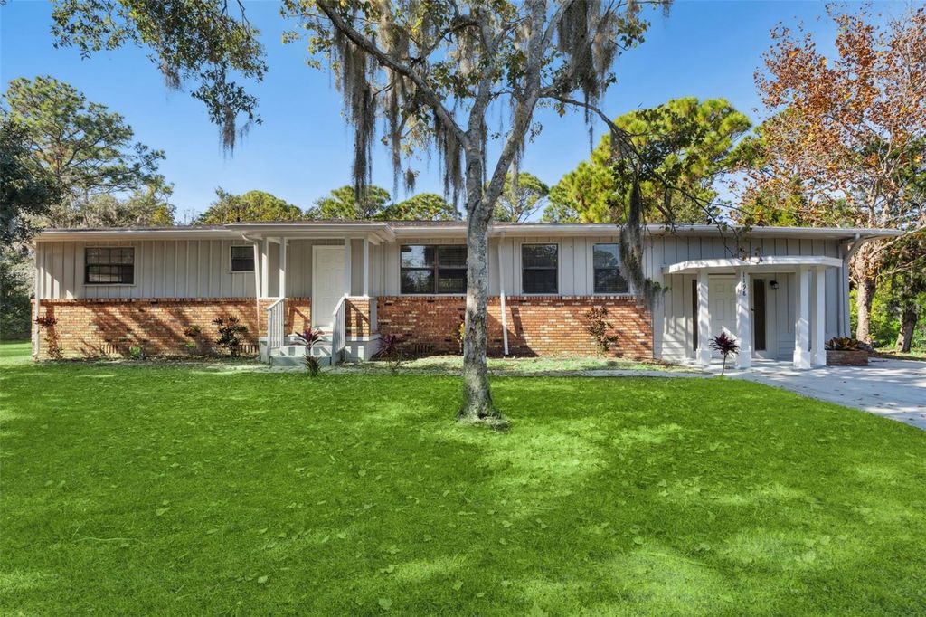 Photo of 1198 S Golf Lake Drive, New Smyrna Beach, FL 32168 (MLS # O6362239)