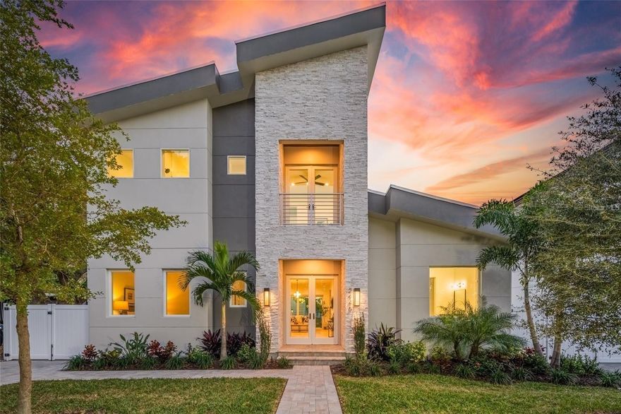 Introducing an exquisite new construction home in the heart of Sarasota, just minutes from downtown and walkable to Arlington Park. This 2,743 sq. ft. modern residence offers 6 bedrooms and 4.5 baths, including a rare detached accessory suite—perfect for hosting guests, accommodating extended family, creating a rental opportunity, or setting up a private office. Inside the main home, an open and light-filled floor plan showcases elegant finishes and a direct view of the pool. The chef’s kitchen features Bosch appliances, quartz countertops, custom cabinetry, and a walk-in pantry, flowing seamlessly into the living room and out to an expansive patio with an outdoor kitchen, paver pool deck, and lush landscaping for effortless indoor–outdoor living. Light-toned engineered hardwood is throughout the home.

The first-floor primary suite is a luxurious retreat, complete with high ceilings, a serene pool view, an oversized walk-in closet, and a spa-inspired bathroom with soaking tub, separate shower, and designer finishes. For convenience, a stacked washer/dryer is tucked into the suite, complemented by a full laundry room upstairs. There is a guest bedroom on the main floor, and an additional three bedrooms upstairs, with full bathrooms and multiple balconies.

Built to the latest codes, this home offers peace of mind with energy-efficient systems, impact-rated windows and doors, modern insulation, and storm-ready construction—delivering lower utility costs, reduced maintenance, and lasting value.

Perfectly situated between Siesta Key and Downtown Sarasota, you’ll enjoy quick access to award-winning beaches, fine dining, shopping, and cultural attractions. Whether you’re entertaining by the pool, enjoying a night out, or unwinding at home, this property offers the ultimate Sarasota lifestyle.