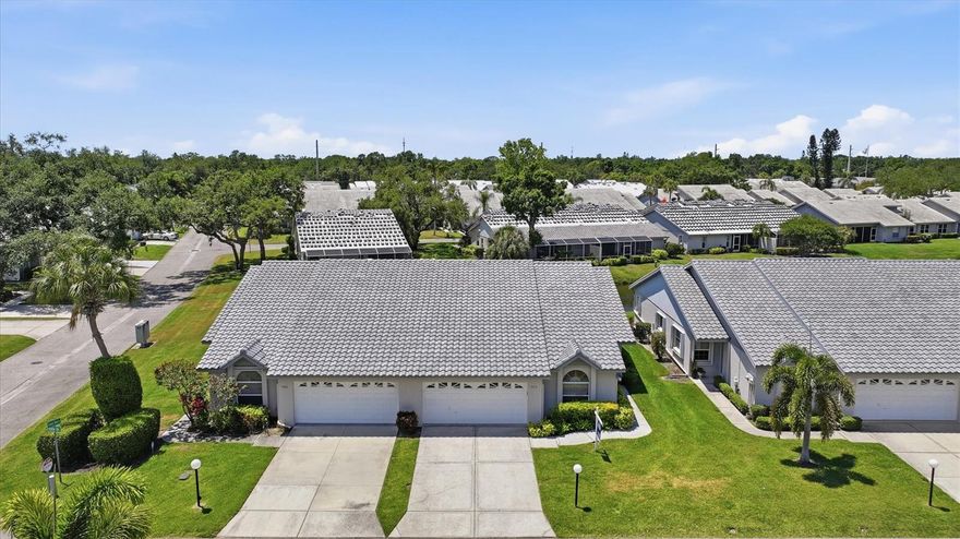 This home is special. Take a peek at this spacious home in Crestwood Villas. It has outstanding features at a reasonable price. This squeaky-clean villa has 3 large bedrooms, 2 full baths, 2 car garage, and 1803 sf of living space. Your screened lanai has a water view right out the back door. Crestwood villas in within 2 miles of several restaurants, shops, Doctor's Hospital, Publix locations, parks, and golf courses. Crestwood also includes a clubhouse, large pool, and tennis court. Exterior and grounds maintenance are included, along with cable, deed restrictions, and full-time management. What is one of the very hot topics in real estate these days? It is your roof. The owner of this outstanding property has already paid for your new roof, and it is expected to be installed in the next 30 to 60 days. When you call for your showing appointment we can also show you this exact, same roof on many of the neighbor's homes right down the street. The clubhouse is large and hosts many functions. It has a kitchen, restrooms, library, and it is large enough to host several card or board game table simultaneously. Sarasota's area attractions include the ambiance and recreational shopping in downtown Sarasota, the beautiful beaches of Siesta Key, and the sparkling water of the Gulf. Within a 15–20-minute drive is the UTC Mall, and many more local attractions and outstanding golf courses. Sarasota offers something for everyone in the family who loves sports, education, fine arts, or history. Your pro-active family and friends will love this villa with both a formal dining room and an eat in kitchen. The home also provides a clear view from the kitchen through the great room and the lanai to the water beyond. The primary bedroom has dual walk-in closets and dual vanities in the en-suite bathroom. There is also an American Home Shield home warranty. Come and see this great home today.