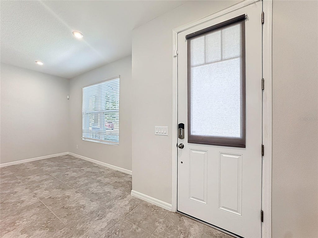 Photo of 10141 Greenstone Ridge Street, Orlando, FL 32832 (MLS # O6425447)