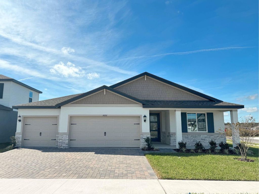 Photo of 36712 Melstone Way, Zephyrhills, FL 33541 (MLS # TB8489335)