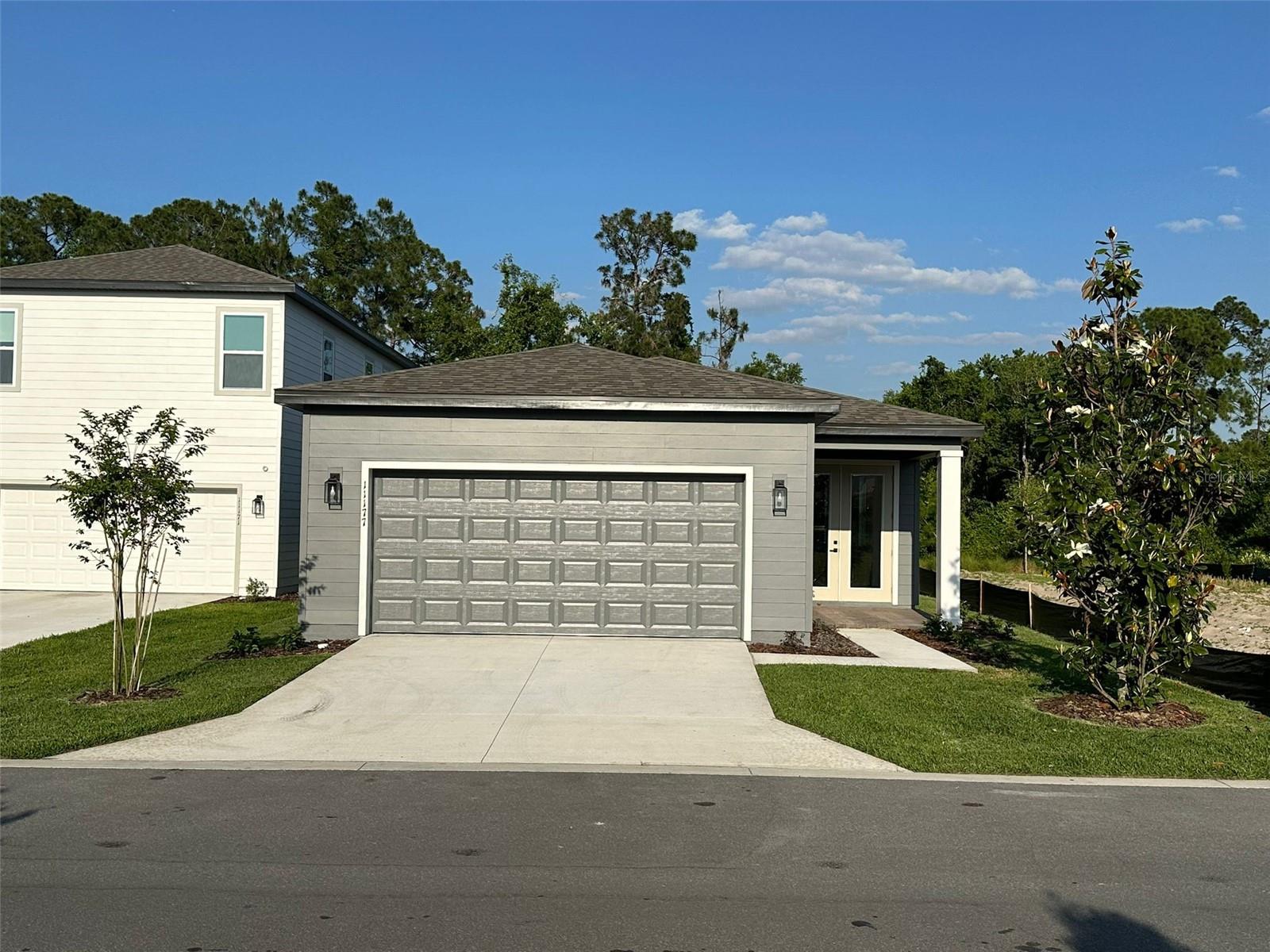 Beautiful 3-bedroom, 2-bath single-family home located in the desirable community of Northlake at Ovation in Winter Garden. This well-maintained property offers 1,798 sq ft of living space on a 4,808 sq ft lot. The open-concept layout features a modern kitchen with stainless steel appliances, granite countertops, and a spacious island. The primary suite includes a walk-in closet and dual-sink vanity. Enjoy the comfort of a private backyard, two-car garage, and access to top-rated schools, shopping, and major highways. Move-in ready and perfectly located!