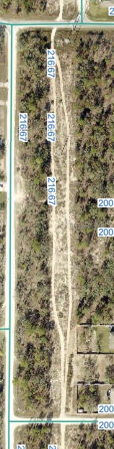 This 2.90 acre parcel that is the easement for the power lines. Zoned R1C. You cannot build on it...but you can play on it and use it for your enjoyment. Best buyer is a home-owner whose lot adjoins it or hold it for possible future investment.
The power company must have access to it at all times for maintenance. Cash only. The property is being transferred with a quit claim deed with no owner's title policy, and if the buyer wants any other deed or title policy, they have to pay for those closing costs