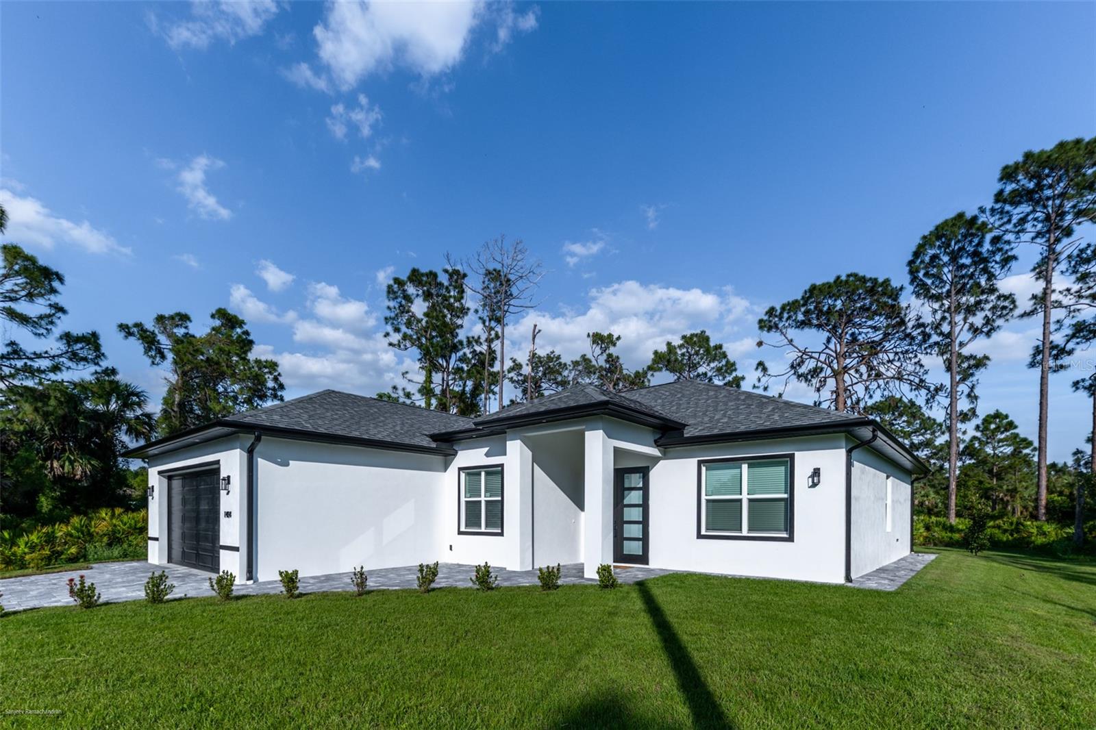 ANNUAL RENTAL- Brand New Construction | Modern Elegance meets Energy Efficiency! 3 Bed + Office | 2 Bath | 2-Car Garage. Be the very first to live in this beautifully designed, brand-new home completed in April 2025, located in a quiet, neighborhood. Offering 1,907 sq ft of living space on a spacious 10,830 sq ft lot (0.25 acre), this 3-bedroom + office, 2-bath home features impeccable finishes, thoughtful upgrades, and quality craftsmanship throughout. Step through the impact-rated fiberglass entry door into an airy, light-filled interior with Lawson brand insulated impact windows and sliders, energy-efficient Daikin A/C, and LED recessed lighting throughout. The expansive open-concept living area is anchored by a custom built-in TV console with integrated LegendFlame fireplace, and flows seamlessly into a chef-inspired kitchen complete with Samsung Bespoke 29 cu. ft. fridge with beverage center, KitchenAid double wall oven, GE electric cooktop, KOBE integrated cabinet hood, Delta brand faucets, Glossy white cabinetry with handles and under-cabinet lighting, Custom coffee bar and walk-in pantry with built-ins. Host in style under elegant modern chandeliers in the dining room and foyer, or enjoy outdoor living on the covered lanai with its own hurricane-impact side door and ceiling fan. The primary suite is a relaxing retreat with a walk-in closet, a luxurious bathroom featuring a freestanding tub, a separate shower, a private toilet, and dimmable, anti-fog LED mirrors. Additional highlights include: Resilient hybrid rigid core plank flooring (eco-friendly & PVC-free), Spacious laundry room with sink and custom cabinetry, Oversized 2-car garage with an additional sink, Whole-house RO water filtration system, Full-lot sprinkler system, Paver driveway, walkway, and sidewalk around the home, Exterior lighting with motion and dusk-to-dawn sensors. Enjoy the low-maintenance Florida lifestyle surrounded by two buttle palms and four magnolias, all beautifully lit with LED under-eave lighting. Unfurnished and ready for immediate occupancy. Experience the peace of mind of new construction combined with modern style and smart functionality at 1484 Rice Terrace.